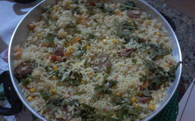 Arroz com calabresa, bacon e carne de sol
