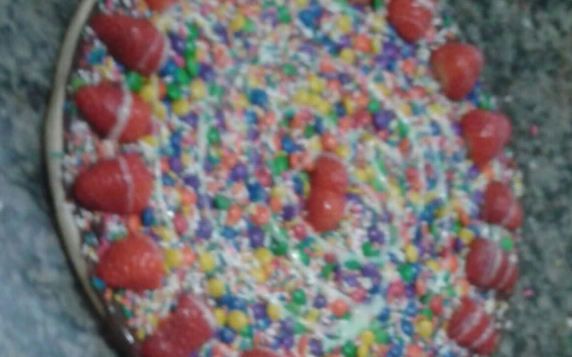 Pizza de chocolate com morango