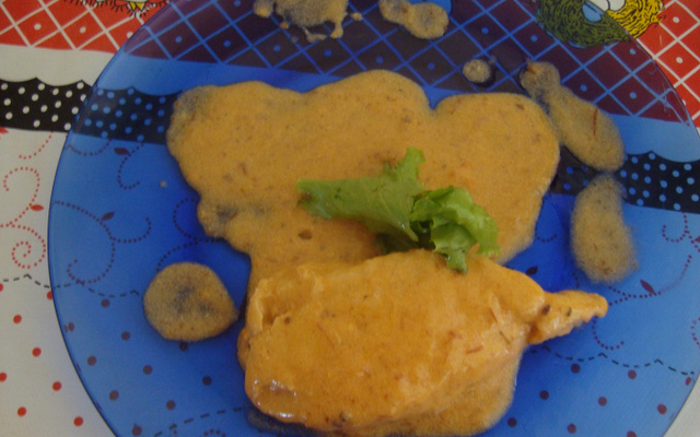 Peixe ao molho de tomate e leite de coco