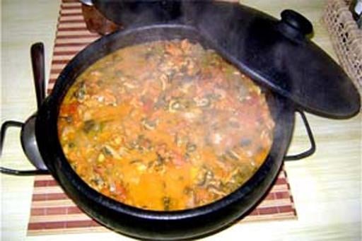 Moqueca de Sururu com farofa de alho