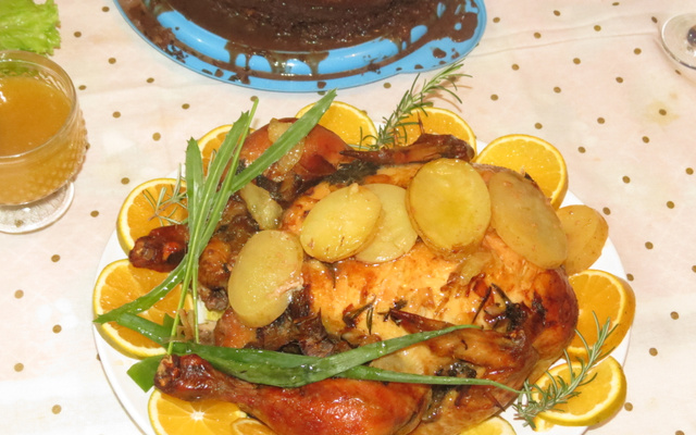 Chester assado com molho de vinho branco e laranja