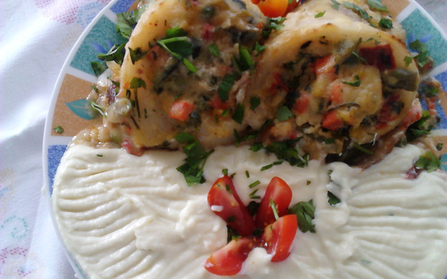 Pescada recheada com legumes