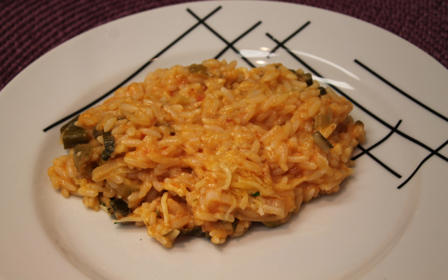 Risoto com tomate seco, mussarela e rúcula da Tam