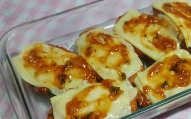 Empanado de frango à Parmegiana