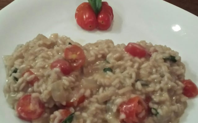 Risoto musarela de bufala, rúcula e tomate cereja