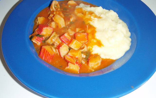 Lulas com kani kama ao coco