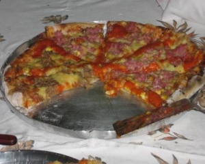 Pizza em forno à lenha