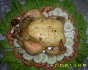 Frango assado com farofa de carne de porco