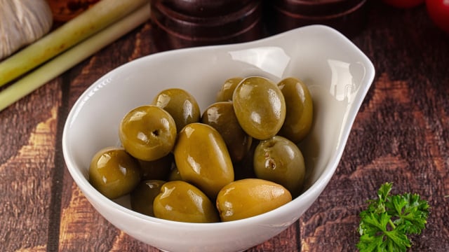 Caroços de azeitona são um tesouro nas mãos: para que servem e como reutilizá-los?