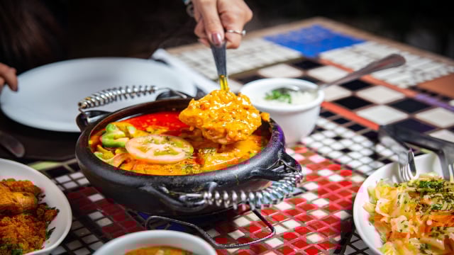 O segredo do TudoGostoso para não talhar o leite de coco na moqueca de peixe