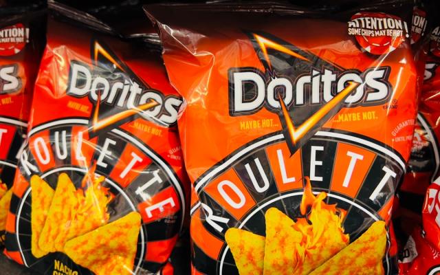 Você arriscaria a sorte em uma roleta de Doritos picantes? (Créditos: Shutterstock/ZikG)